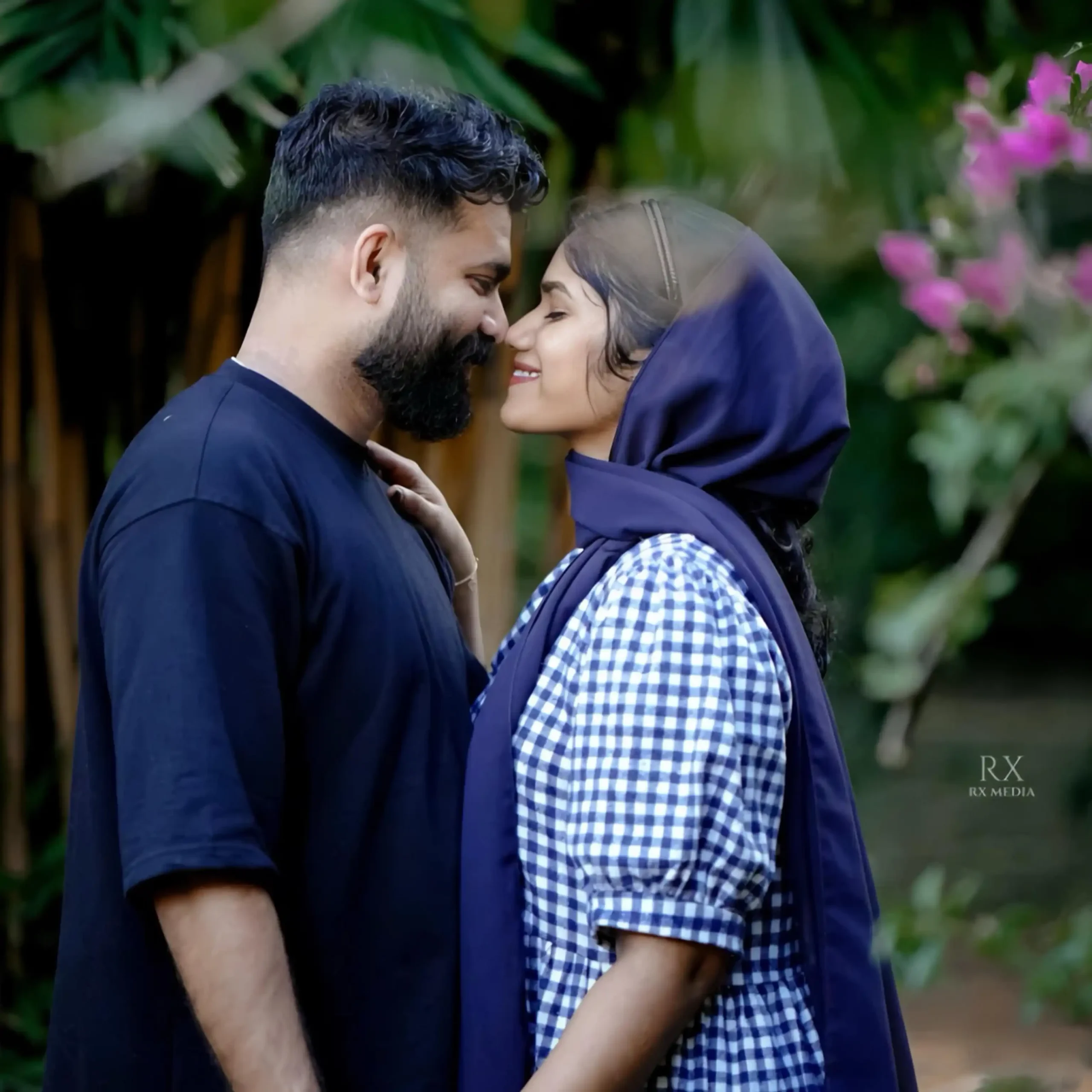 Bride and groom sharing a romantic gaze, captured by the best wedding photographer in Malappuram – perfect save-the-date moment.
