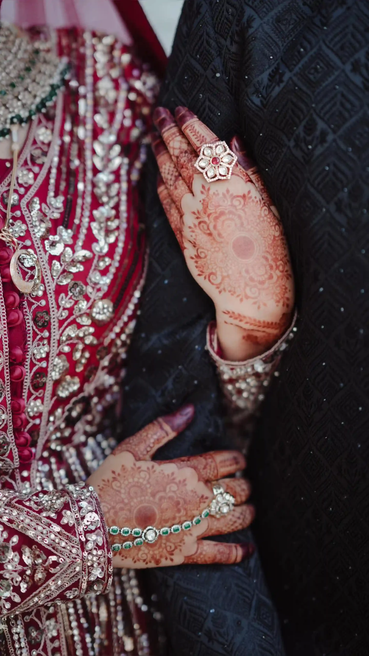 Bride and groom holding hands in a wedding moment, captured by the best wedding photographer in Malappuram