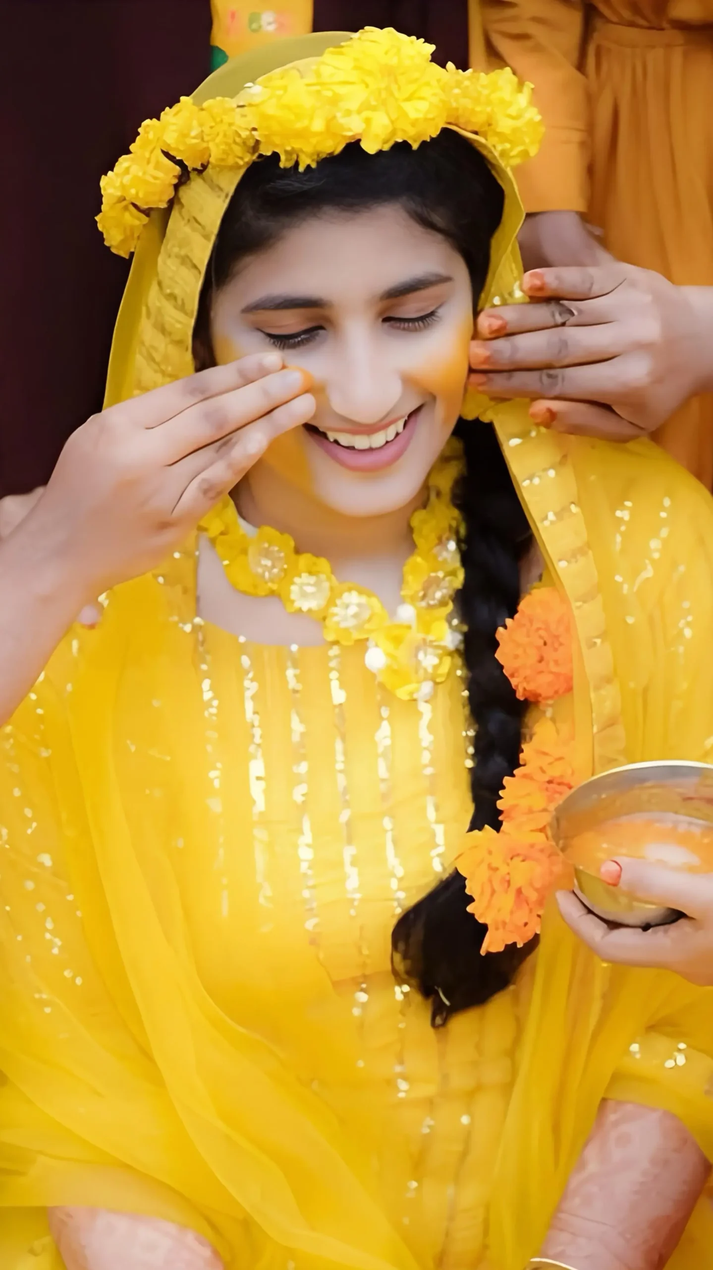 Beautiful Haldi bride glowing with turmeric ceremony traditions, captured by the best wedding photographer in Malappuram